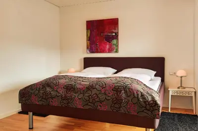 Ein Bett oder Betten in einem Zimmer der Unterkunft Weingut & Gästehaus Christoph Clüsserath