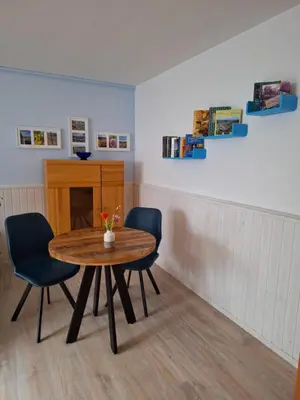 Ein Sitzbereich in der Unterkunft Ferienwohnung Tintemann