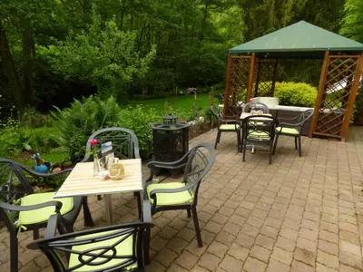 Ein Garten an der Unterkunft Wald Villa Üssbach