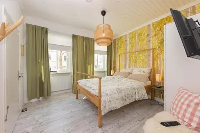Ein Bett oder Betten in einem Zimmer der Unterkunft FerienNest Bad Ems, Appartment WaldNest