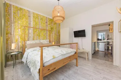 Ein Bett oder Betten in einem Zimmer der Unterkunft FerienNest Bad Ems, Appartment WaldNest