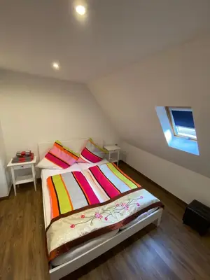 Ein Bett oder Betten in einem Zimmer der Unterkunft Vintage Apartment