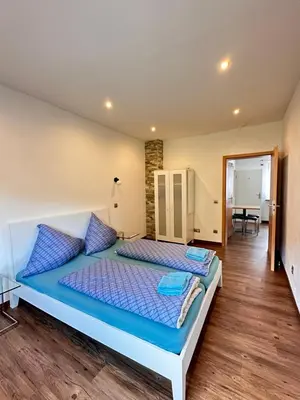 Ein Bett oder Betten in einem Zimmer der Unterkunft Vintage Apartment