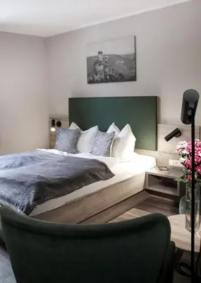 Ein Bett oder Betten in einem Zimmer der Unterkunft Historische Mühle Vogelsang