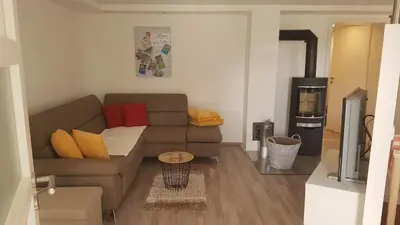 Ein Sitzbereich in der Unterkunft Ferienwohnung Zur Waldkapelle