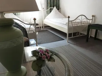 Ein Bett oder Betten in einem Zimmer der Unterkunft Hotel Jägerhof