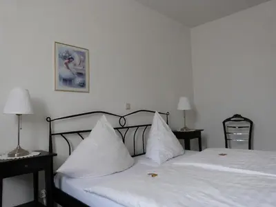 Ein Bett oder Betten in einem Zimmer der Unterkunft Hotel Jägerhof