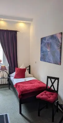 Ein Bett oder Betten in einem Zimmer der Unterkunft Hotel Jägerhof