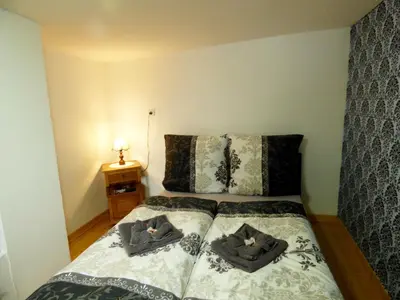 Ein Bett oder Betten in einem Zimmer der Unterkunft Relaxen am Rosenbusch