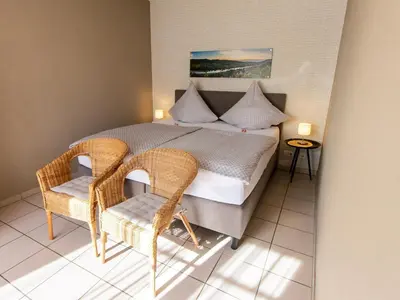 Ein Bett oder Betten in einem Zimmer der Unterkunft Romantischer Aufenthalt mit Blick auf den Weinberg