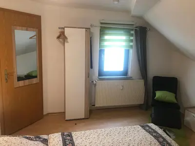 Ein Bett oder Betten in einem Zimmer der Unterkunft FeWo 194 Green