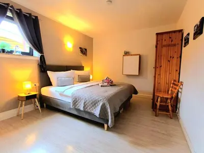 Ein Bett oder Betten in einem Zimmer der Unterkunft Ferienwohnung 