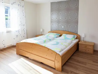 Ein Bett oder Betten in einem Zimmer der Unterkunft Farmhouse Escape in Haserich