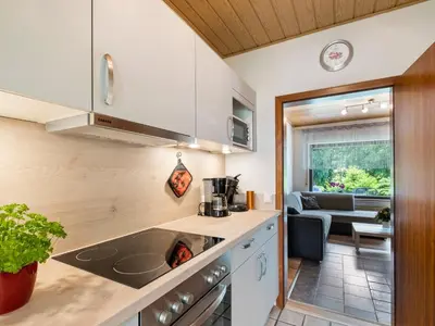 Küche/Küchenzeile in der Unterkunft Feusdorf Forest Bungalow