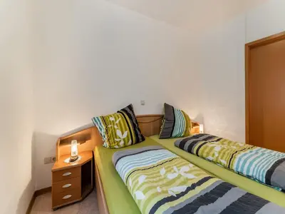 Ein Bett oder Betten in einem Zimmer der Unterkunft Moselanmut in Ediger-Eller