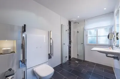 Ein Badezimmer in der Unterkunft Jagdschloss Hotel Niederwald