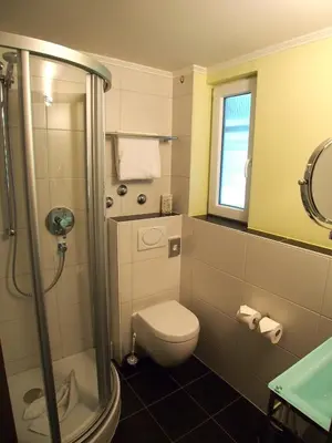 Ein Badezimmer in der Unterkunft Top Hotel Krämer