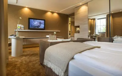 Ein Bett oder Betten in einem Zimmer der Unterkunft Land & Golf Hotel Stromberg