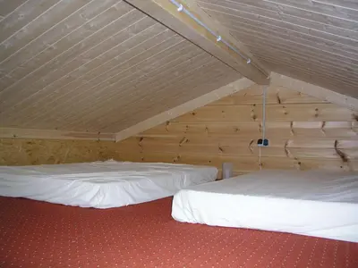 Ein Bett oder Betten in einem Zimmer der Unterkunft Traumhaus am See 2