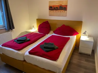 Ein Bett oder Betten in einem Zimmer der Unterkunft Traumhaus am See 2
