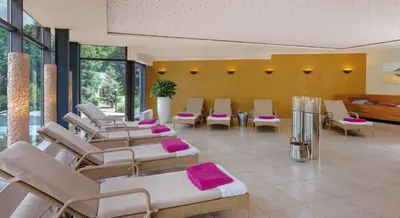 Ein Sitzbereich in der Unterkunft Nells Park Hotel