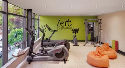 Das Fitnesscenter und/oder die Fitnesseinrichtungen in der Unterkunft Nells Park Hotel