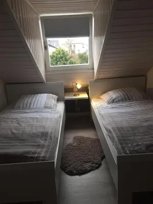 Ein Bett oder Betten in einem Zimmer der Unterkunft Ferienhaus Elisa