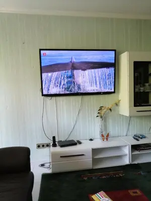 TV/Unterhaltungsangebot in der Unterkunft Schönes Apartment mit Pool&Sauna