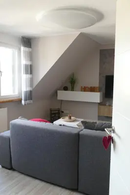 Ein Sitzbereich in der Unterkunft Ferienwohnung Haus am Calmont