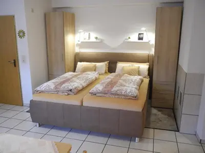 Ein Bett oder Betten in einem Zimmer der Unterkunft Ferienwohnung Heinen