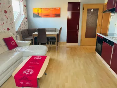 Ein Sitzbereich in der Unterkunft Ferienwohnung Hochwaldblick 1