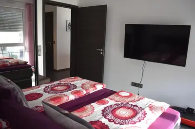 Ein Bett oder Betten in einem Zimmer der Unterkunft FEWO Excellence