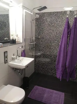 Ein Badezimmer in der Unterkunft FEWO Excellence