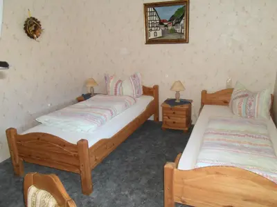 Ein Bett oder Betten in einem Zimmer der Unterkunft Hotel Finkenberg