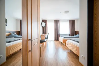 Ein Bett oder Betten in einem Zimmer der Unterkunft Hotel-Restaurant Langen