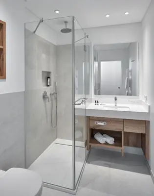 Ein Badezimmer in der Unterkunft Sporthotel Grafenwald 4 Sterne Superior