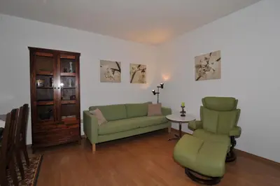 Ein Sitzbereich in der Unterkunft Weinhotel Lenz