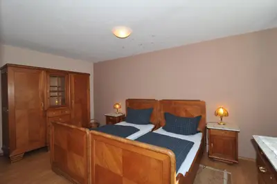 Ein Bett oder Betten in einem Zimmer der Unterkunft Weinhotel Lenz