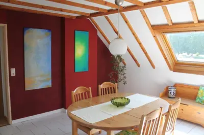 Ein Sitzbereich in der Unterkunft Ferienwohnung im Galerie-Haus