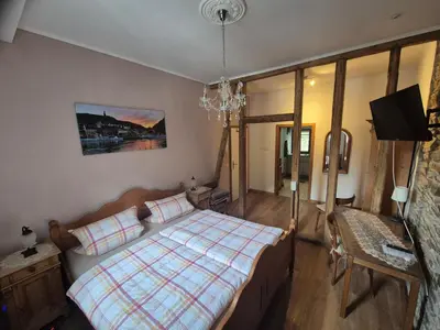 Ein Bett oder Betten in einem Zimmer der Unterkunft Ehemaliges Winzerhaus Cochem