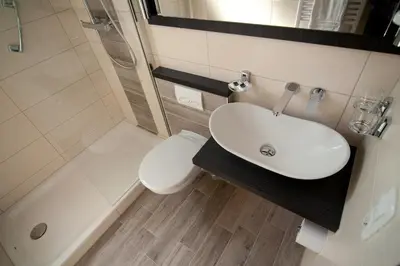 Ein Badezimmer in der Unterkunft Hotel Restaurant Pollmanns