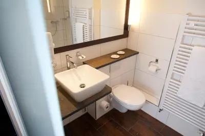 Ein Badezimmer in der Unterkunft Hotel Restaurant Pollmanns