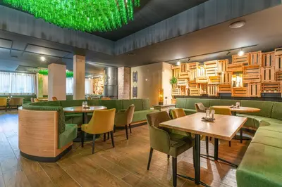 Ein Sitzbereich in der Unterkunft Hotel Restaurant Pollmanns