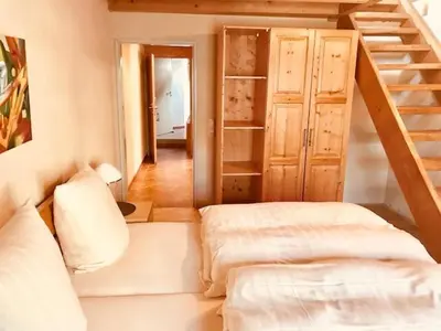 Ein Bett oder Betten in einem Zimmer der Unterkunft Hotel Weingut Dehren