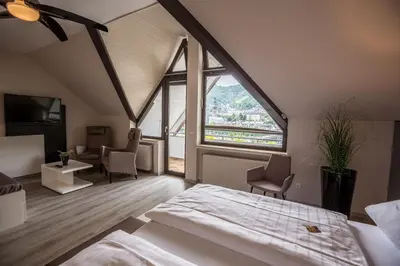Ein Bett oder Betten in einem Zimmer der Unterkunft Hotel Traumblick