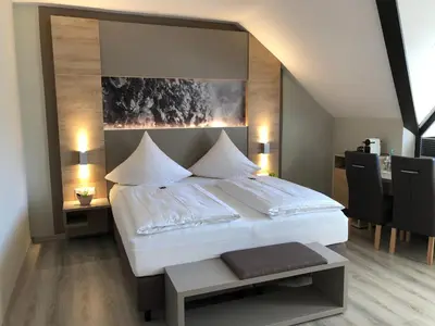 Ein Bett oder Betten in einem Zimmer der Unterkunft Hotel Traumblick