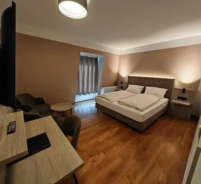 Ein Bett oder Betten in einem Zimmer der Unterkunft Berghotel Kockelsberg