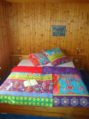 Ein Bett oder Betten in einem Zimmer der Unterkunft Haus 2 - Typ A (Appartement)