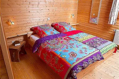 Ein Bett oder Betten in einem Zimmer der Unterkunft Haus 1 - Typ C (kombiniert)