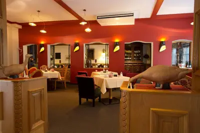 Ein Restaurant oder anderes Speiselokal in der Unterkunft AKZENT Hotel Berg's Alte Bauernschänke- Wellness und Wein
